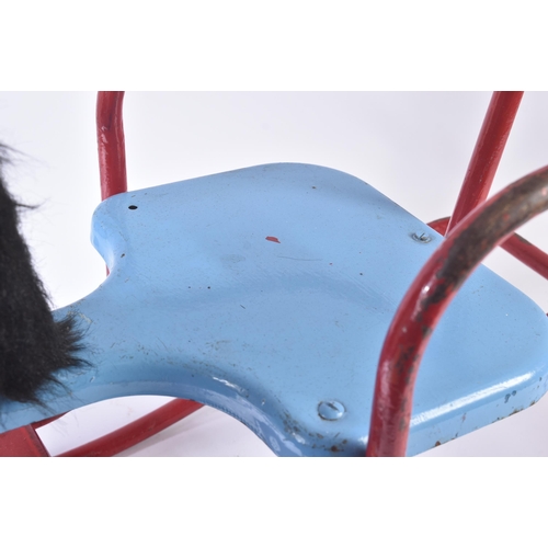 108 - A vintage Triang / Tri-ang childrens rocking horse on a red metal frame with blue seat and a moulded... 