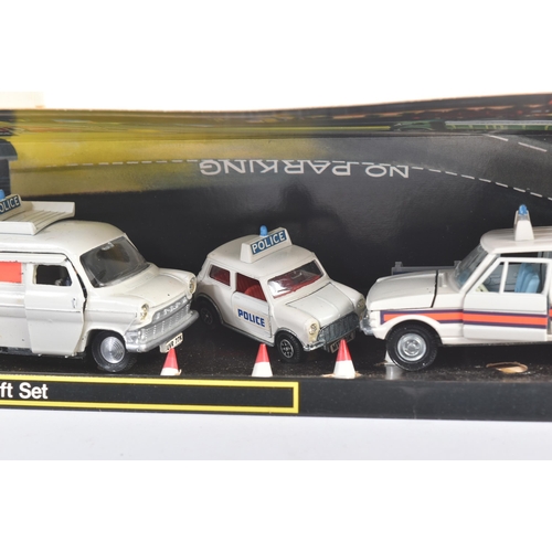 13 - An original vintage Dinky Toys boxed diecast gift set No. 294 Police Vehicles. The set containing No... 