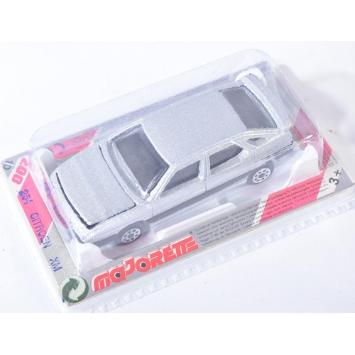 142 - A collection of x12 assorted French Majorette diecast model cars to include; 270 Renault Clio, 252 H... 