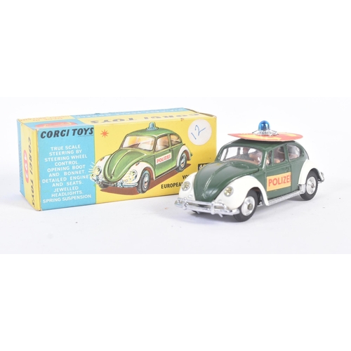 16 - A vintage Corgi Toys diecast model No. 492 Volkswagen European Police Car. The model with dark green... 