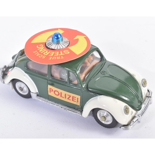 16 - A vintage Corgi Toys diecast model No. 492 Volkswagen European Police Car. The model with dark green... 