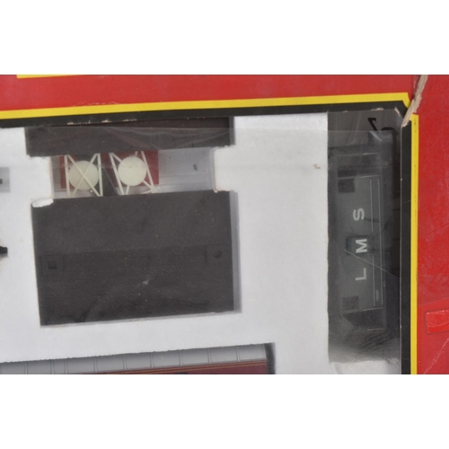 164 - A vintage Hornby OO gauge model railway locomotive trainset No. R791 LMS Express Passenger. The set ... 