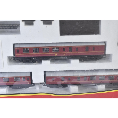 164 - A vintage Hornby OO gauge model railway locomotive trainset No. R791 LMS Express Passenger. The set ... 