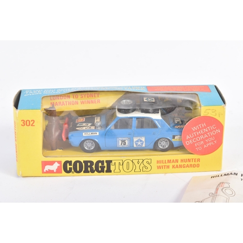 175 - An original vintage Corgi Toys diecast model No. 302 Hillman Hunter with Kangaroo. The model appeari... 