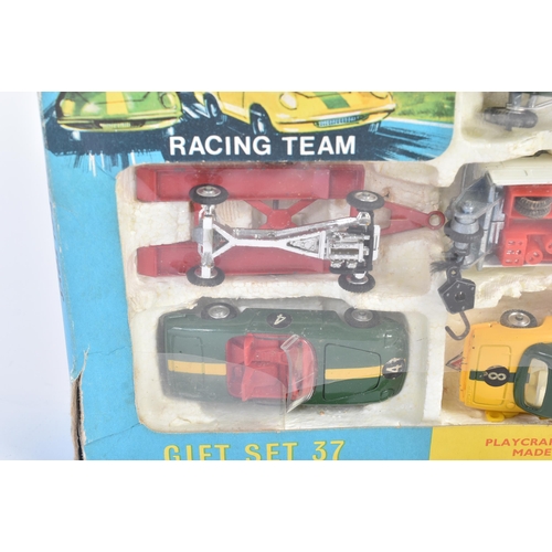 2 - An original vintage Corgi Toys boxed diecast gift set No. 37 Lotus Racing Team. The set containing a... 