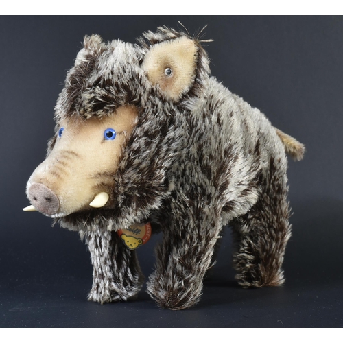 23 - An original vintage German Steiff made soft toy teddy bear Wild Boar 'Dalle'. Complete with original... 