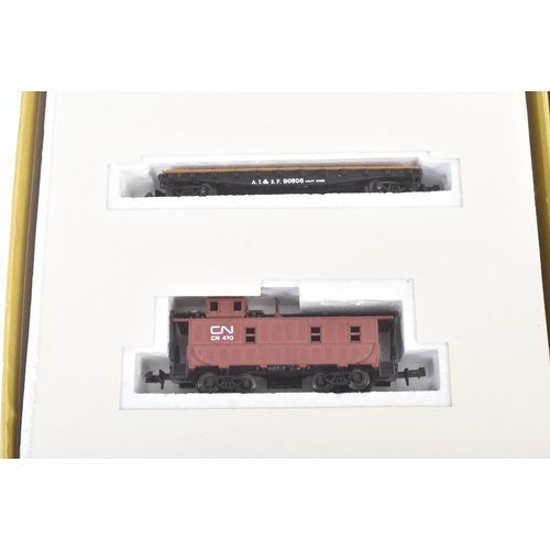 27 - A vintage Aurora / Minitrix ' Postage Stamp Trains ' N gauge model railway trainset locomotive set. ... 