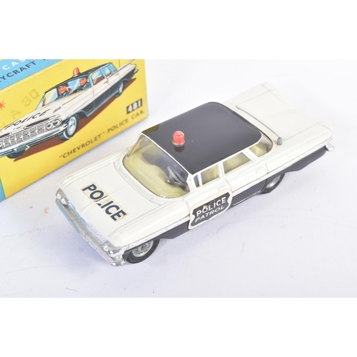 28 - A vintage Corgi Toys boxed diecast model No. 481 Chevrolet Police Car with driver and passenger figu... 