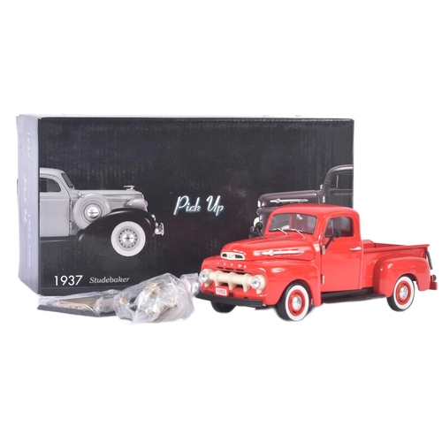 328 - A vintage Unique Replicas 1/24 scale boxed diecast model No. 79003 Ford Pick Up in red with detachab... 