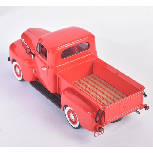 328 - A vintage Unique Replicas 1/24 scale boxed diecast model No. 79003 Ford Pick Up in red with detachab... 