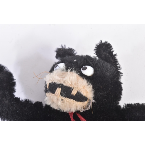 34 - Felix The Cat - an early 20th century c1920s Felix The Cat stuffed toy. Black and white mohair, with... 