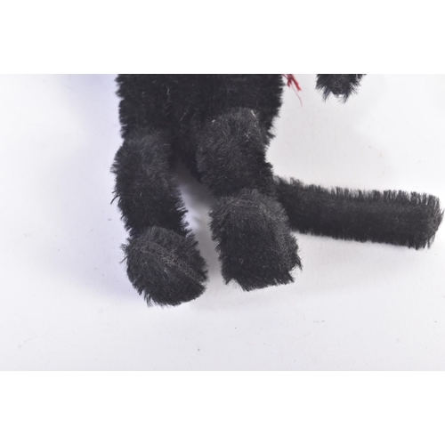 34 - Felix The Cat - an early 20th century c1920s Felix The Cat stuffed toy. Black and white mohair, with... 