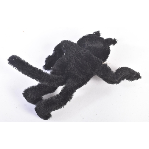 34 - Felix The Cat - an early 20th century c1920s Felix The Cat stuffed toy. Black and white mohair, with... 