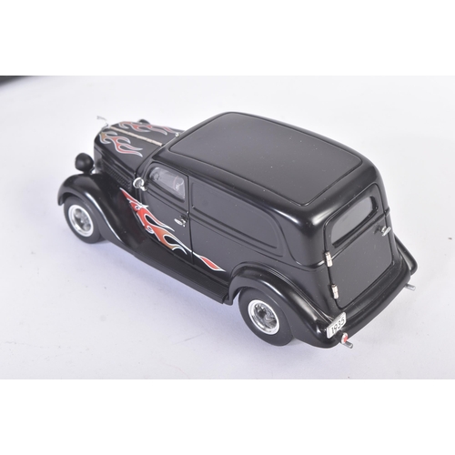 42 - A vintage Unique Replicas 1/24 scale boxed diecast model No. 78404 1935 Ford Sedan Street Road versi... 