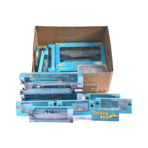 429 - A large collection of assorted Triang / Tri-ang Minic  boxed and carded model ships, largely 1/1200 ... 