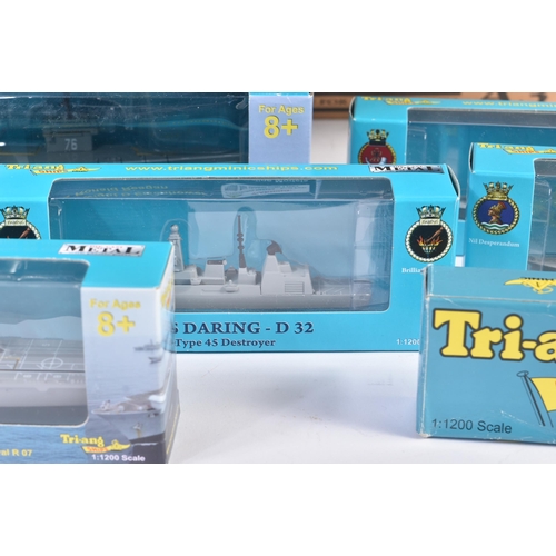 429 - A large collection of assorted Triang / Tri-ang Minic  boxed and carded model ships, largely 1/1200 ... 