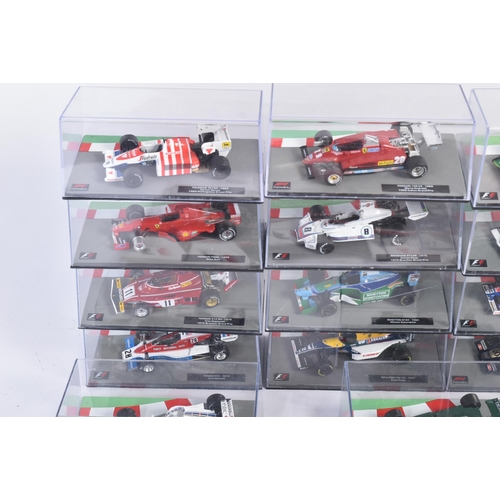 431 - A collection of 1/43 scale boxed diecast model cars of Formula One interest with accompanying magazi... 