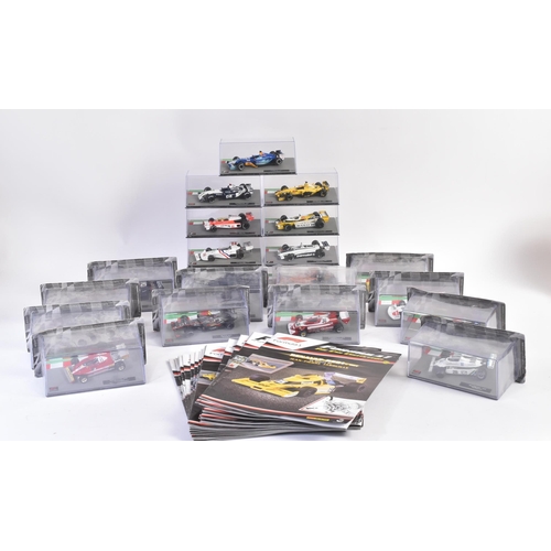 434 - A collection of 1/43 scale boxed diecast model cars of Formula One interest with accompanying magazi... 