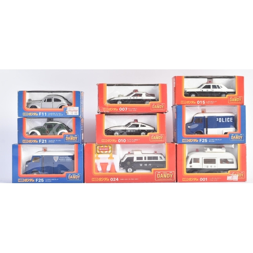 435 - A collection of x9 Tomica Dandy (Japan) made 1/43 scale diecast model cars of Police interest. Examp... 