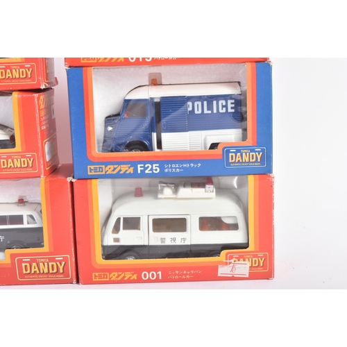 435 - A collection of x9 Tomica Dandy (Japan) made 1/43 scale diecast model cars of Police interest. Examp... 