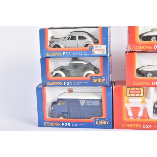 435 - A collection of x9 Tomica Dandy (Japan) made 1/43 scale diecast model cars of Police interest. Examp... 