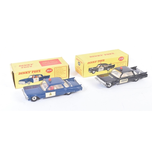 437 - Two vintage Dinky Toys diecast model cars comprising; 258 USA Police Car and 264 R.C.M.P Royal Canad... 