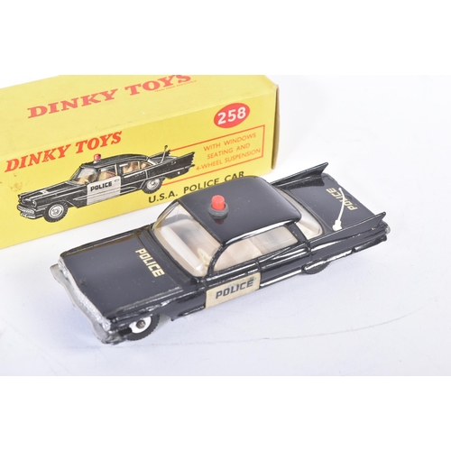 437 - Two vintage Dinky Toys diecast model cars comprising; 258 USA Police Car and 264 R.C.M.P Royal Canad... 