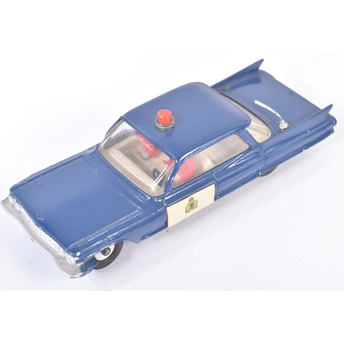 437 - Two vintage Dinky Toys diecast model cars comprising; 258 USA Police Car and 264 R.C.M.P Royal Canad... 