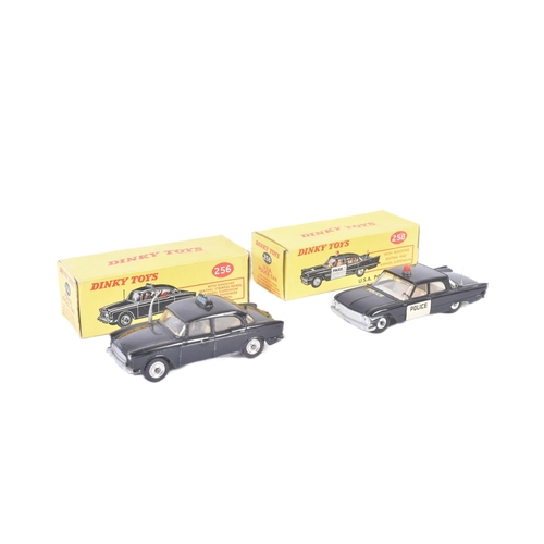 438 - Two vintage Dinky Toys boxed diecast model cars comprising; No. 258 USA Police Car and No. 256 Polic... 