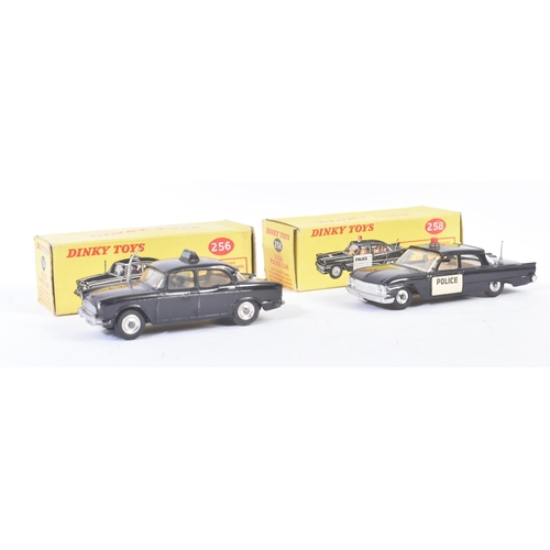 438 - Two vintage Dinky Toys boxed diecast model cars comprising; No. 258 USA Police Car and No. 256 Polic... 