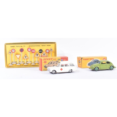 439 - A collection of vintage Dinky Toys diecast models comprising; No. 771 International Road Signs, No. ... 