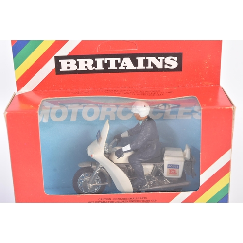 44 - Two vintage Britains 1/32 scale diecast and plastic model motorcycles comprising; 9695 BMW Policeman... 