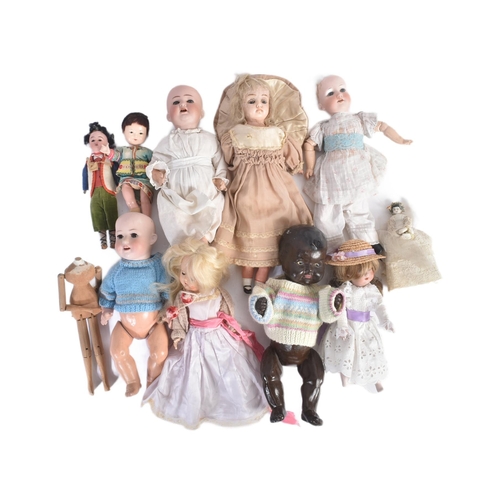 440 - A collection of assorted early 20th Century bisque head and composition dolls to include German Heub... 