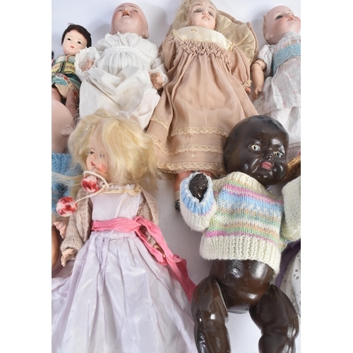 440 - A collection of assorted early 20th Century bisque head and composition dolls to include German Heub... 