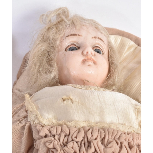 440 - A collection of assorted early 20th Century bisque head and composition dolls to include German Heub... 