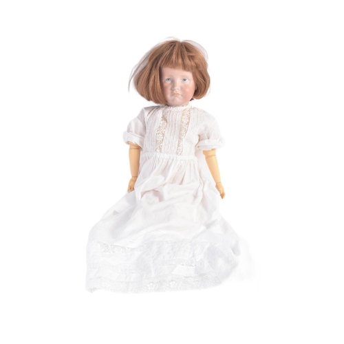 450 - An early 20th Century German ' Kammer & Reinhardt ' bisque headed doll with a replacement compositio... 