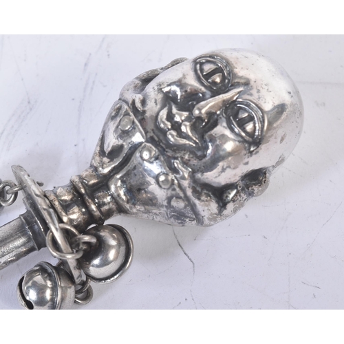 453 - A 19th century EPNS silver plated babies rattle in the form of Humpty Dumpty. With three attached be... 