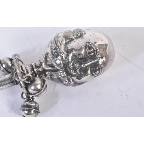 453 - A 19th century EPNS silver plated babies rattle in the form of Humpty Dumpty. With three attached be... 