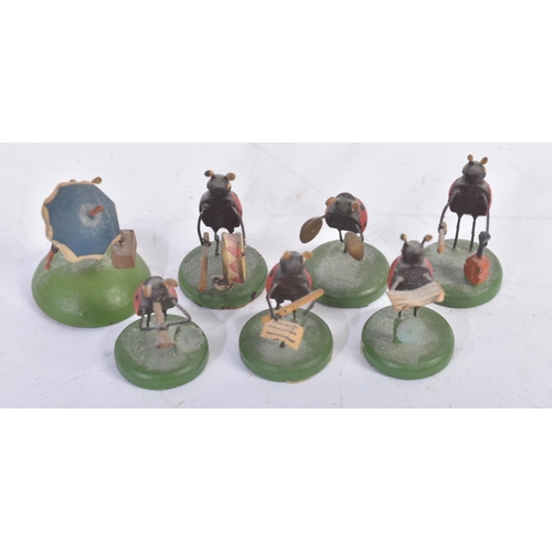 456 - A collection of vintage believed German made wooden miniature ladybird / ladybug figures. The hand p... 