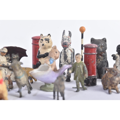 457 - A collection of assorted vintage lead and hollowcast hand painted figures to include; Muffin The Mul... 