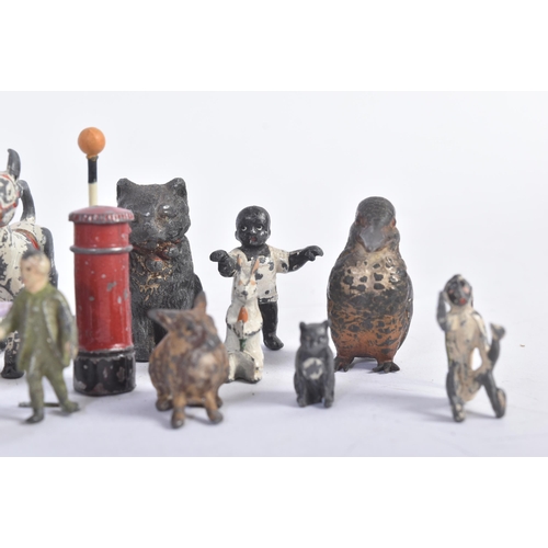 457 - A collection of assorted vintage lead and hollowcast hand painted figures to include; Muffin The Mul... 