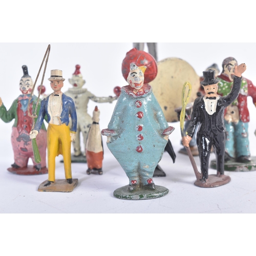 458 - A collection of vintage believed Britains made lead toy circus figures to include; clowns, ring lead... 