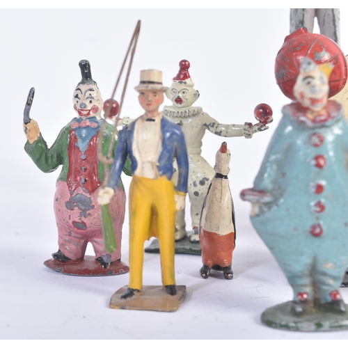 458 - A collection of vintage believed Britains made lead toy circus figures to include; clowns, ring lead... 