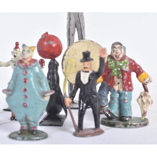 458 - A collection of vintage believed Britains made lead toy circus figures to include; clowns, ring lead... 