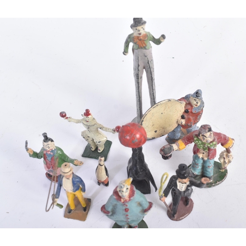 458 - A collection of vintage believed Britains made lead toy circus figures to include; clowns, ring lead... 