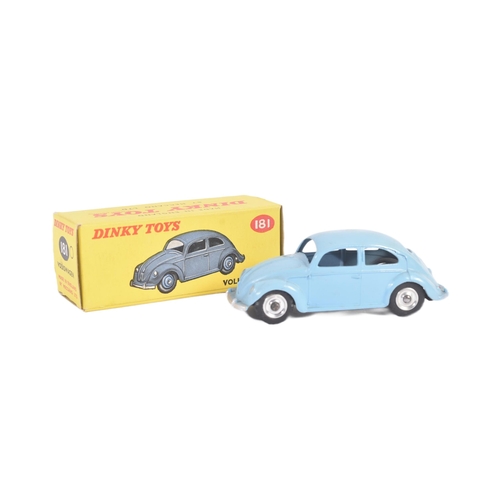 56 - An original vintage Dinky Toys diecast model No. 181 Volkswagen Beetle car. Light blue exterior with... 