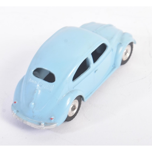 56 - An original vintage Dinky Toys diecast model No. 181 Volkswagen Beetle car. Light blue exterior with... 