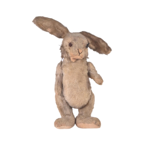 89 - A mid 20th Century vintage soft toy teddy bear in the form of a Hare / Bunny Rabbit. Firmly stuffed ... 