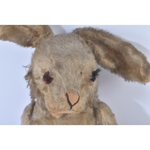 89 - A mid 20th Century vintage soft toy teddy bear in the form of a Hare / Bunny Rabbit. Firmly stuffed ... 