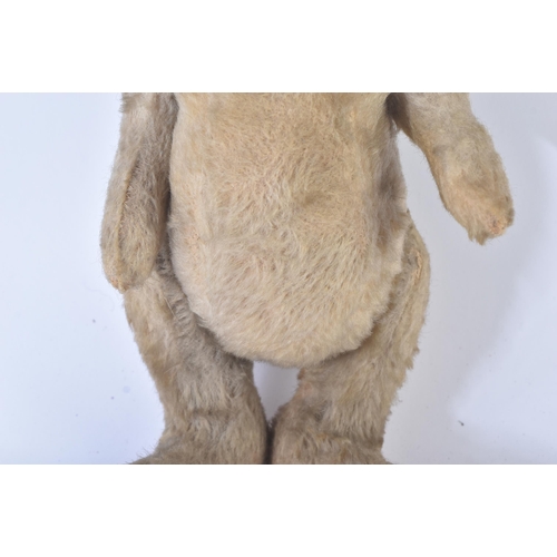 89 - A mid 20th Century vintage soft toy teddy bear in the form of a Hare / Bunny Rabbit. Firmly stuffed ... 